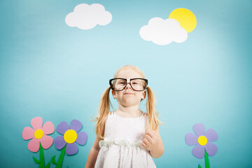 Happy Nerdy Little Girl in Imaginary Outside Wonderland World