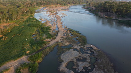 Fototapeta na wymiar low tide on the banks of the river Progo