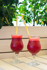 Berry smoothies in glass glasses. Summer refreshing drink.