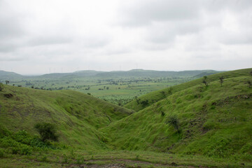 Fototapeta premium LANDSCAPE GREEN HILL SLOPE WITH CLOUD 