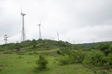 WIND MILL TURBINES ON GREEN HILL 