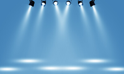 Spotlights illuminate empty stage