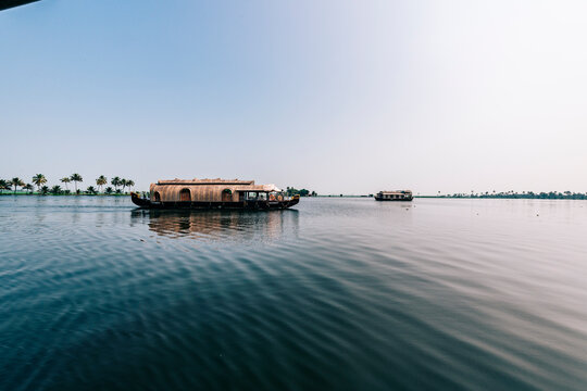 Houseboat In Lake Against Clear Sky