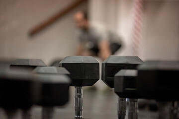 close up of dumbbells in the gym