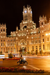 Naklejka premium Late evening on the main street of Madrid in night illumination. Madrid, Spain