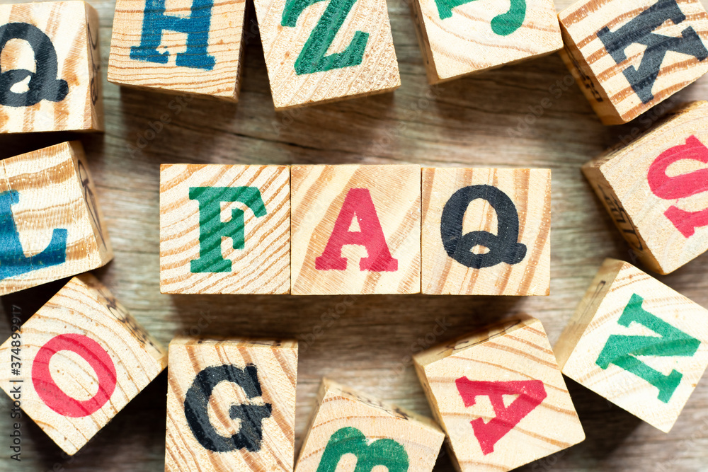 Poster Alphabet letter block in word  FAQ (Abbreviation of Frequently Asked Questions) with another on wood background