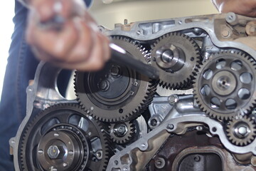 Fototapeta premium The mechanic is checking the engine.