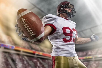 American football sportsman player on stadium with lights on background