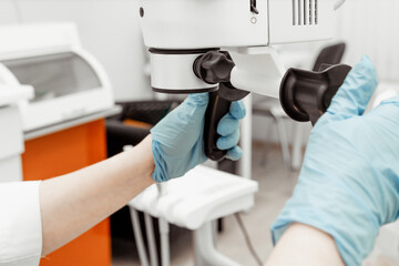 Fototapeta premium A professional microscope in a dental clinic. Modern equipment in dentistry. Medical equipment