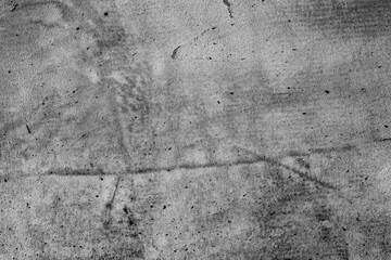 Texture of a concrete wall with cracks and scratches which can be used as a background