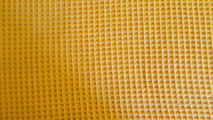 Orange fabric texture for background close up top view