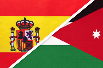Spain and Jordan, symbol of two national flags from textile. Partnership between European and Asian countries.