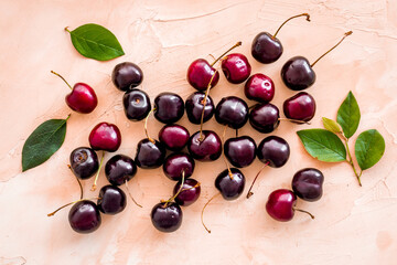 Red sweet cherry texture or wallpaper. Flat lay of berries, top view