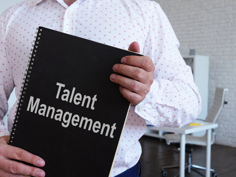 Talent Management is shown on the conceptual business photo