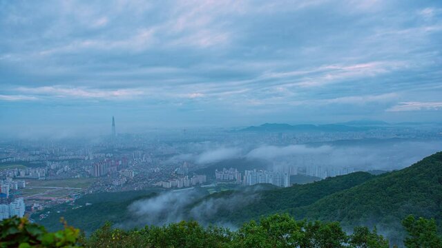 Time laps 4k, landscape of Seoul with fog in the morning.And the tallest building in Seoul City South Korea. 