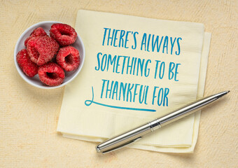 theres is always something to be thankful for - inspirational handwriting on a napkin, mindset and positivity concept