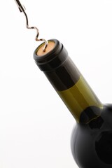 Close-up Of Wine Bottle Being Opened
