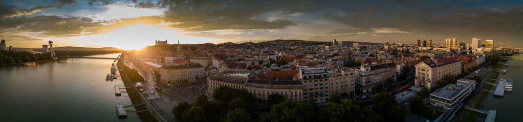 Bratislava panorama with ferris wheel aerial drone at sunset