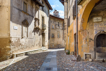 Fototapeta premium The narrow streets in ancient village Castello Cabiaglio in the province of Varese, Lombardy, Italy.