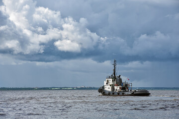 The ship is sailing on the sea.