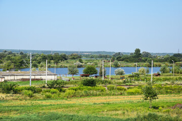 Fototapeta na wymiar Panorama of the countryside, several ponds and houses, beautiful nature.