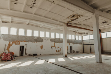 Inside an old industrial hall.