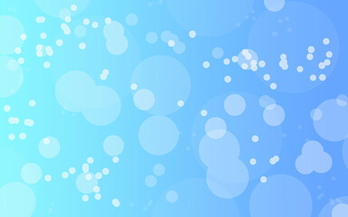 Light blue bokeh background with soft lights.