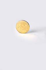 Currency - 20 Cent Euro Coin on White Background with Copy Space