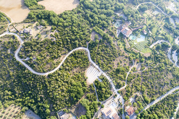 Aerial view of the sunrise in the valley of the orc, the sun just arose, the countryside in Tuscany