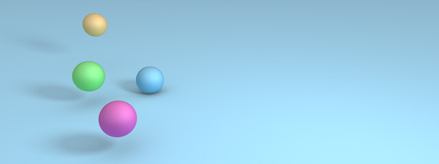 Colored balls are bouncing on a blue surface.
