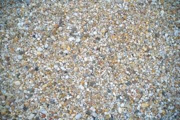 sand made up of small colored stones on the beach of Is Arutas in Sardinia, Italy. Is Arutas is considered one of the most beautiful beaches in the world