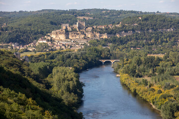  The medieval Chateau de Beynac rising on a limestone cliff above the Dordogne River seen from...