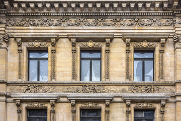 Fototapeta na wymiar Architectural fragment of Brussels Bourse, which houses the country's Stock Exchange. The building erected from 1868 to 1873 in the Neo-Renaissance style. Brussels, Belgium.