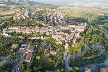 Flying over San Quirico d'Orcia. A country in Tuscany
