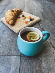  Cup of tea and croissant 