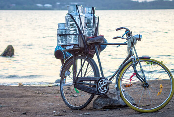 Special bicycle for carrying milk on the beach