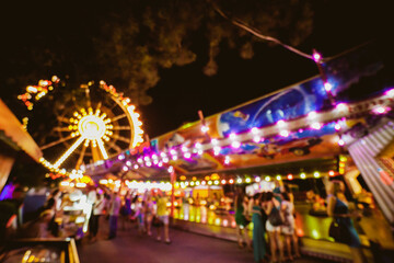 Children's Carousel at an amusement park in the evening and night illumination. amusement park at night. amusement park, picture for the background. © Vladibulgakov