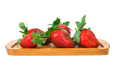 Strawberries on the small wooden board