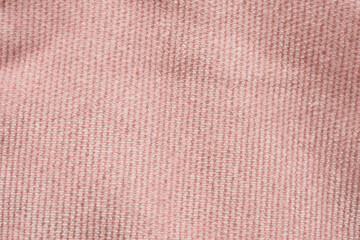 Pink fabric cloth texture background close up