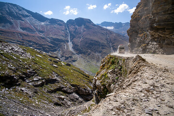 Leh, Manali dirt road massive rocky mountains steep drops