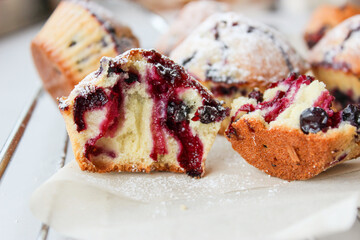 Currant muffins sprinkled with powdered sugar