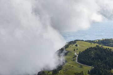 Mountain road with clouds in Monte Grappa