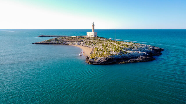 Aerial view of the lighthouse of Vieste situated on an island on the Gargano Peninsula in Italy