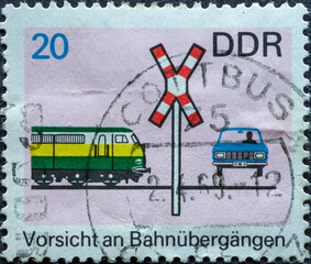 GERMANY, DDR - CIRCA 1969: a postage stamp from Germany, GDR showing a traffic sign for a railroad...