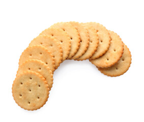 Delicious crispy crackers isolated on white, top view