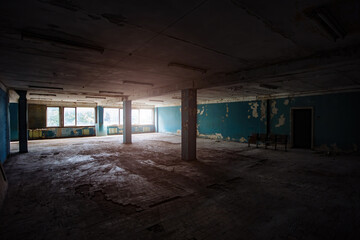 Dark abandoned industrial or office building interior