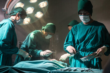 Operating room nurse prepare surgical equipment for surgeon