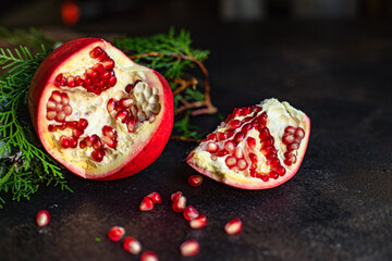 pomegranate sweet ripe red fruit on the table new year treat christmas serving portion size top view place copy space for text