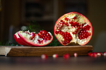 pomegranate sweet ripe red fruit on the table new year treat christmas serving portion size top view place copy space for text