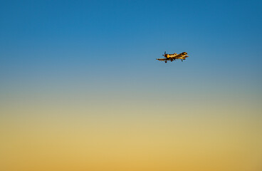 Fototapeta na wymiar Flight in orange and blue